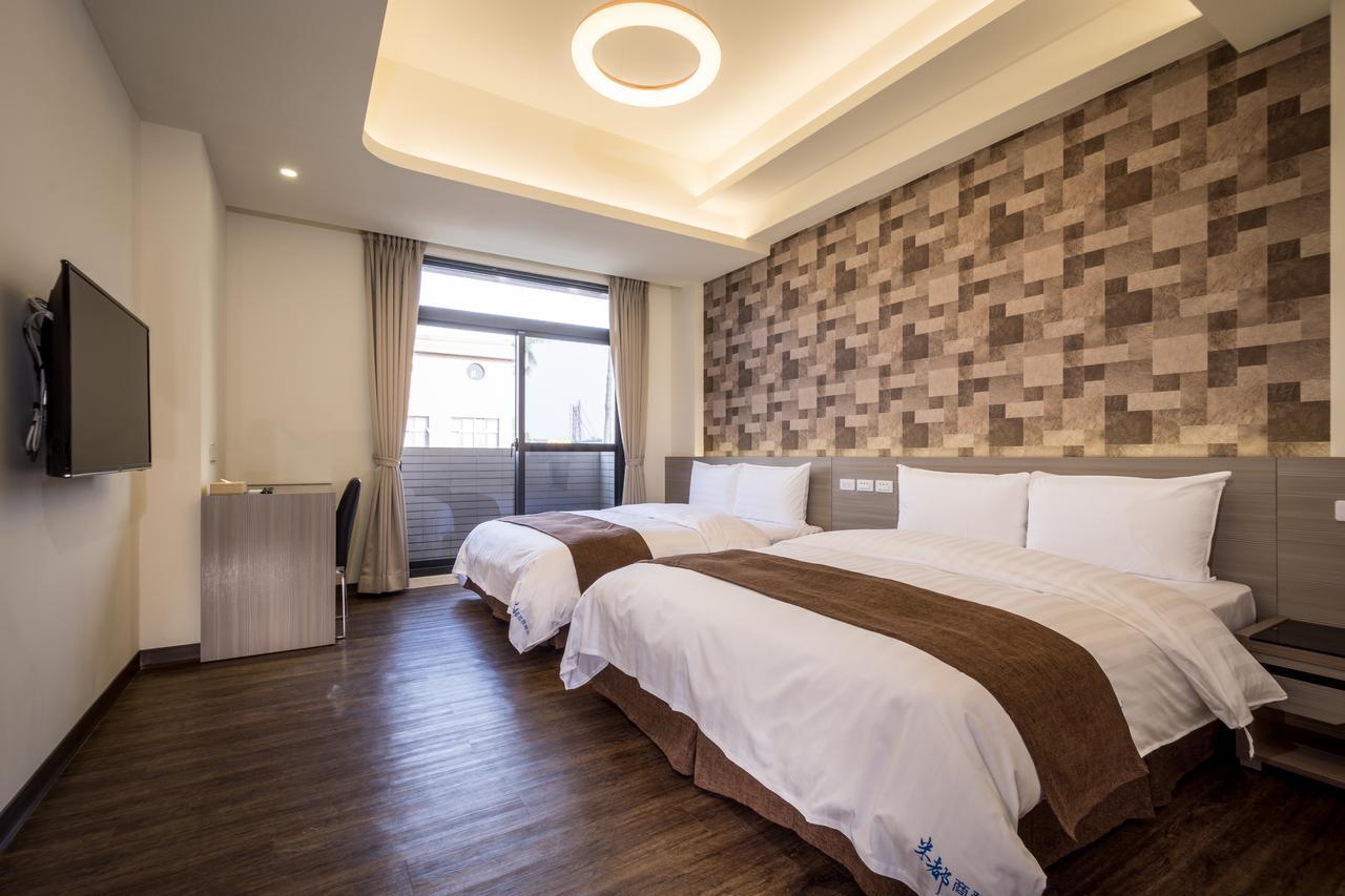 Midu Business Hotel Xiluo Exterior foto