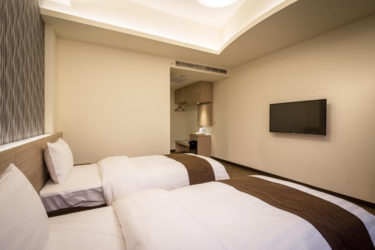 Midu Business Hotel Xiluo Exterior foto